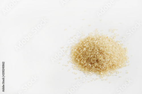 Brown sugar On a white background and empty left space for text.