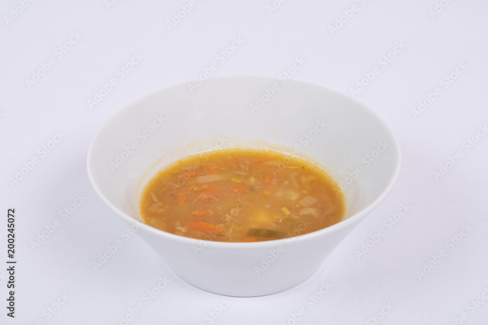 Potato soup with flakes on a white Potato soup with flakes on a white