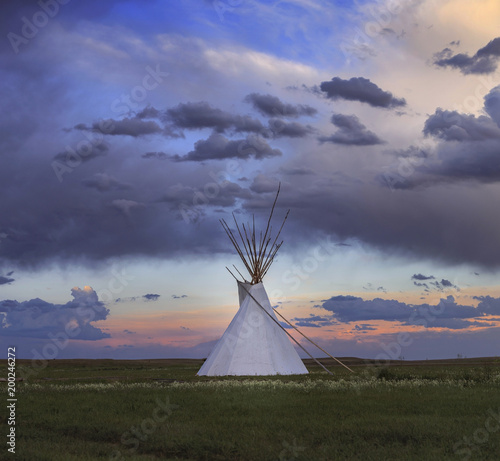 Indian wigwam at sunset