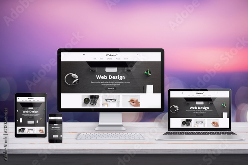 Responsive web site design presentation on computer, laptop, tablet and smart phone display.