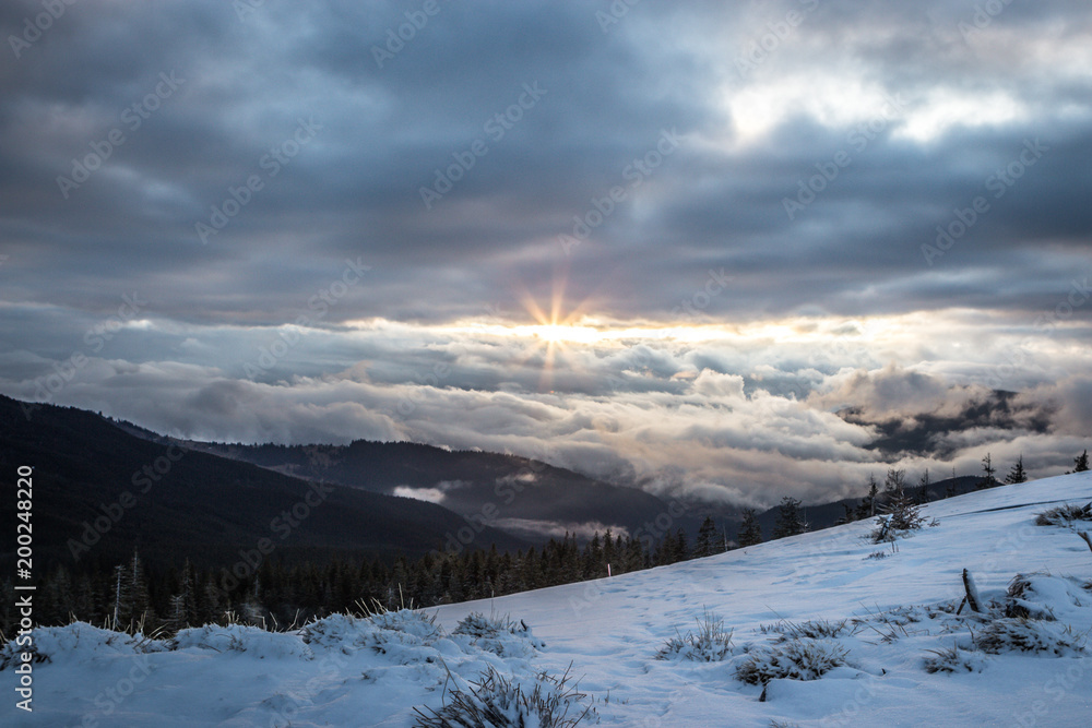 Panorama snow mountains landscape. Sunrise over Carpathian mountain in Ukraine.