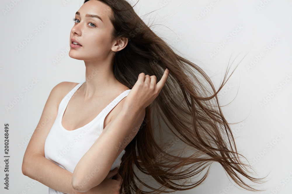 Fototapeta premium Beautiful Woman With Long Hair.