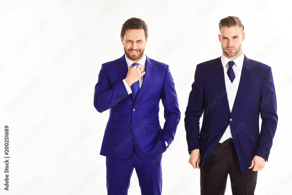 Businessmen in suits on white background. Man with beard Businessmen in suits on white background. Man with beard