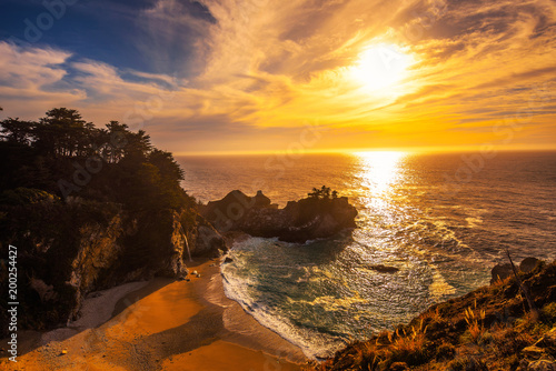 Sunset over McWay Falls on Pacific Coast Highway in California