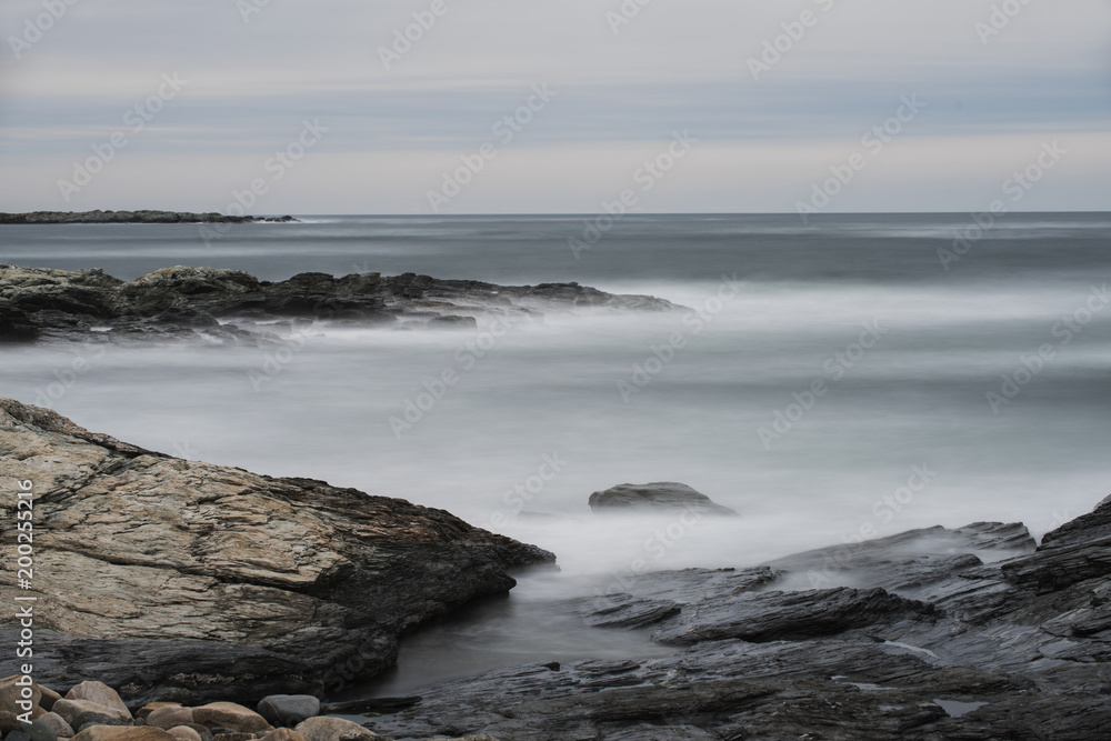 Ocean Waves Over Rocks at Cliff Walk in Rhode Island