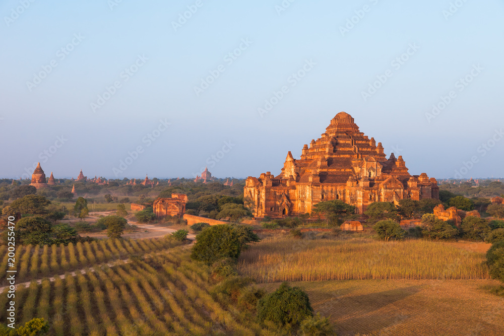 Dhammayangyi Temple after sunset and amazing view of landscape at Old Bagan archaeological zone in Myanmar.
