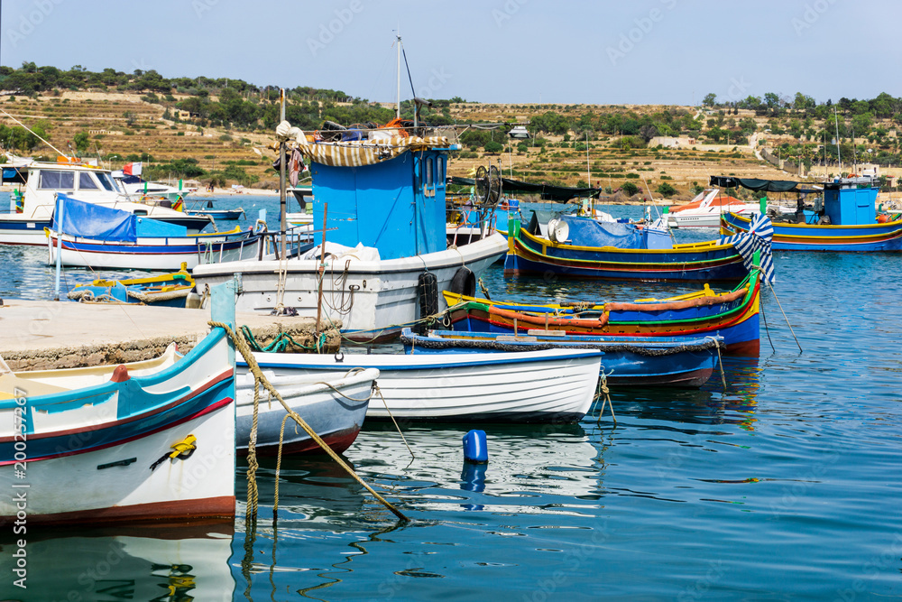 Traditional boats at Marsaxlokk Harbor in Malta