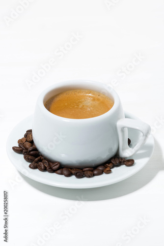 morning cup of espresso on a white background, vertical