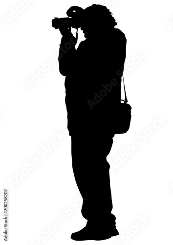 Man with a photo camera on white background