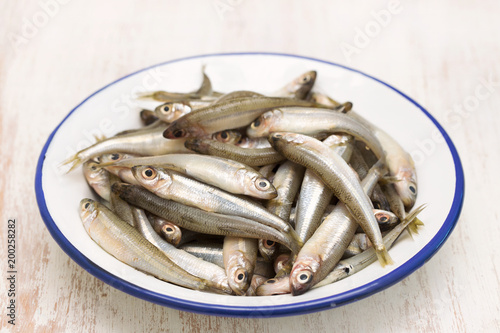 small fish in white plate