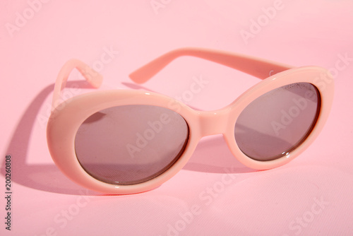 sunglasses on pink background