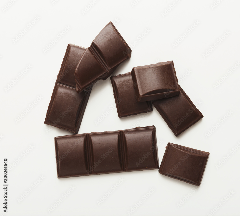 Bar of dark chocolate isolated on white Bar of dark chocolate isolated on white