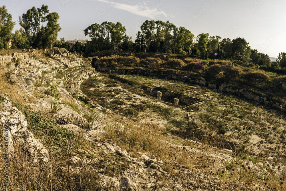 Ruins of an old Greek amphitheater in Syracuse, Italy