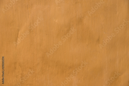 Orange concrete wall background abstract.