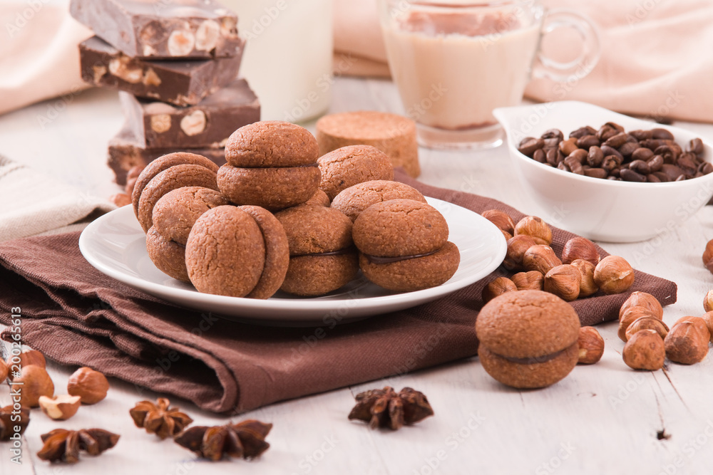 Hazelnut shortbread sandwiches filled with chocolate cream Hazelnut shortbread sandwiches filled with chocolate cream