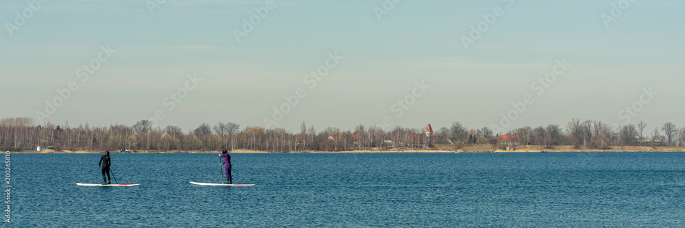 Stand up paddling at the Schladitzer Lake near Leipzig, Germany, Panorama
