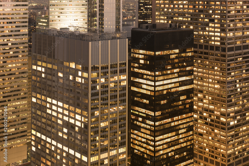 © Alex Fradkin - View of modern skyscrapers in city at night