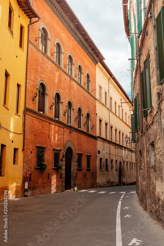 Journey to Italy. The narrow streets of Siena with colored houses