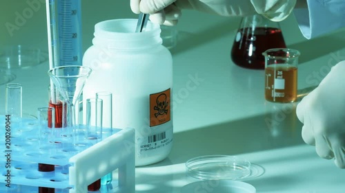 Researcher mixes toxic substances in a laboratory