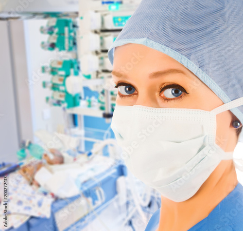 female doctor in pediatric intensive care unit