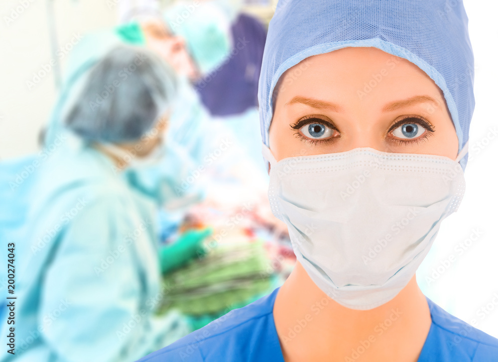 Female surgeon in operation room Female surgeon in operation room