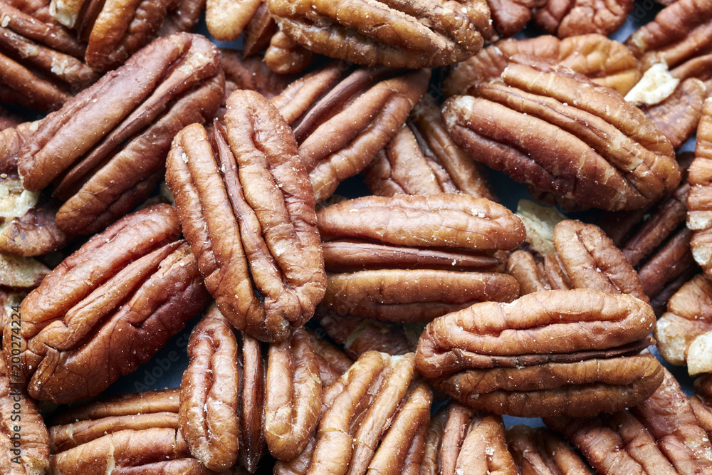 Close up picture of pecan nuts, selective focus. Close up picture of pecan nuts, selective focus.