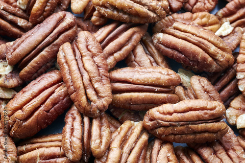 Close up picture of pecan nuts, selective focus.