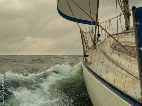 Seascape from sailing boat before storm , dark clouds