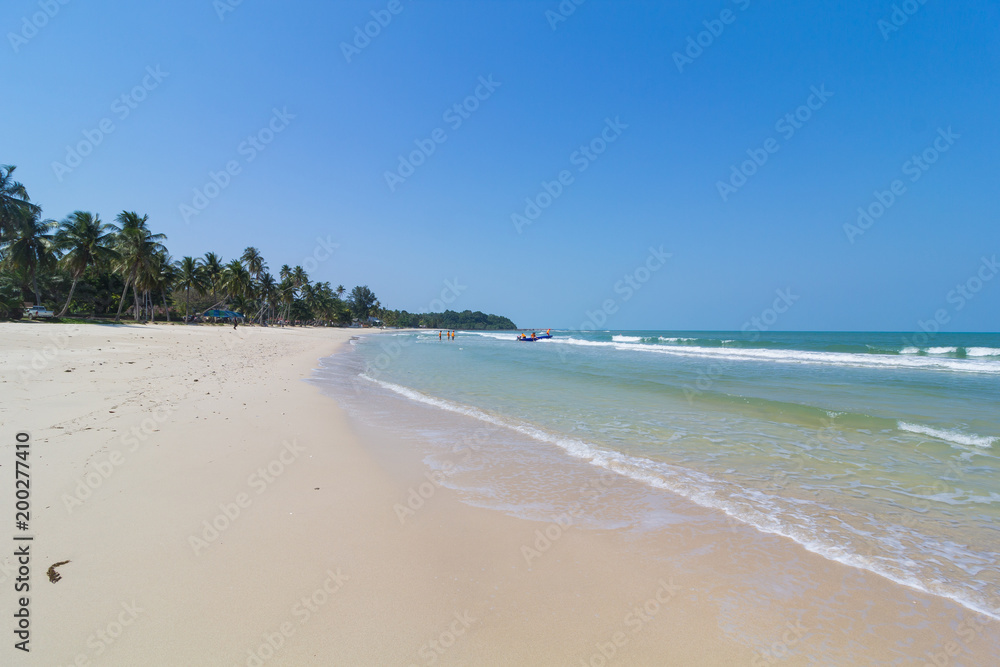 White sandy beach, blue sky, clear sea, summer