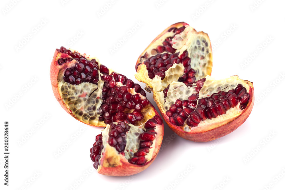 pomegranate with seeds isolated on white background pomegranate with seeds isolated on white background