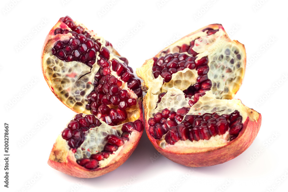 pomegranate with seeds isolated on white background pomegranate with seeds isolated on white background