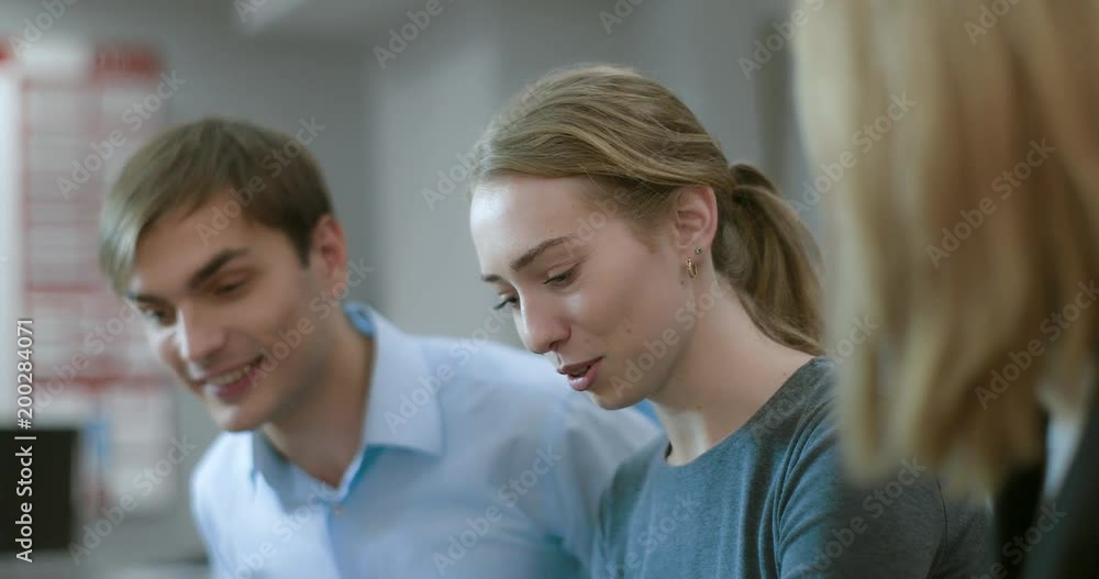 Young married couple is getting advice on the interior issue Young married couple is getting advice on the interior issue