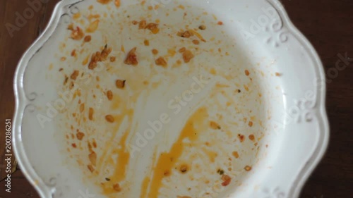 Cleaning Plate sauce with Bread. Top View