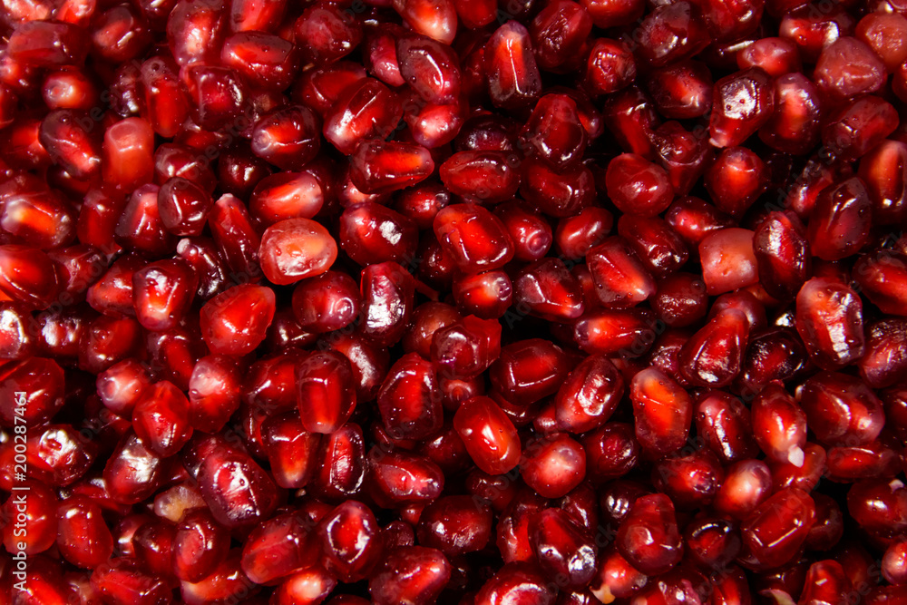 Food background of the fresh ripe pomegranate seeds Food background of the fresh ripe pomegranate seeds