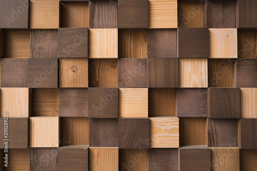 Modern abstract wooden texture with many square planks. © Olga Zarytska