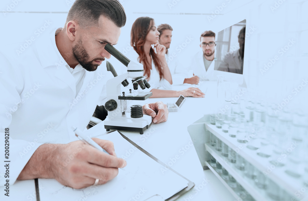 young scientist works in the lab. young scientist works in the lab.