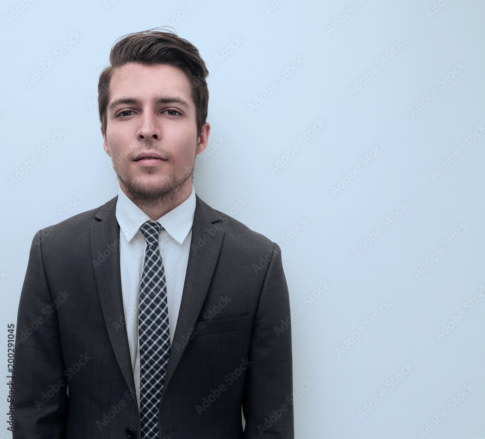 closeup.serious businessman.isolated on a light background. closeup.serious businessman.isolated on a light background.
