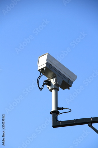 security camera on a metal pole