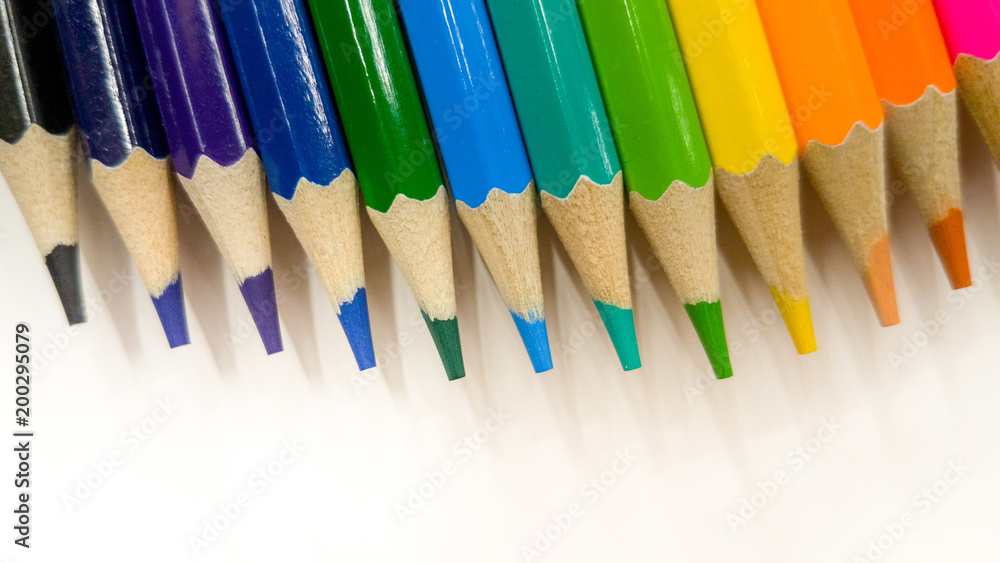 Colored pencils on a white background Colored pencils on a white background