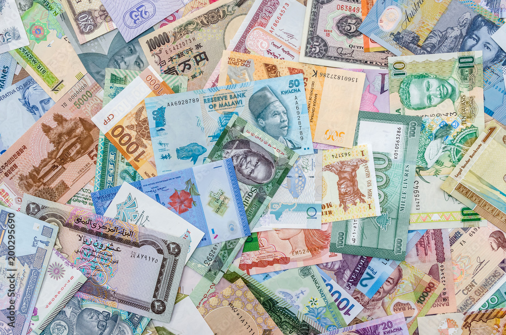 World banknotes collection mixed on table, top view