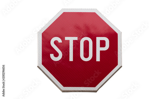 Red octagonal stop traffic sign with text isolated on white background