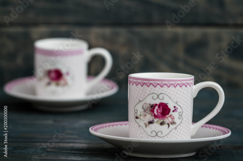 Decorative Colorful Porcelain Coffee set on Wooden Background