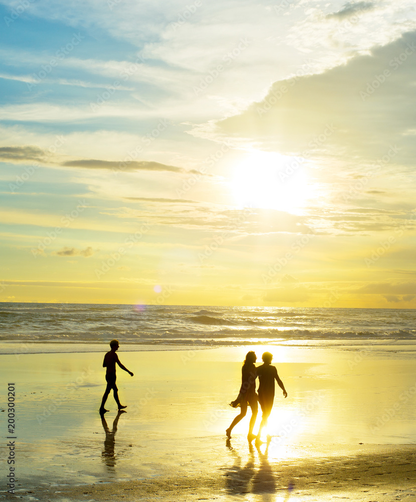 People walking at ocean beach