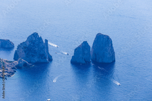 Italy. Island Capri. Faraglioni rocks and boats from Monte Solaro, in Anacapri photo