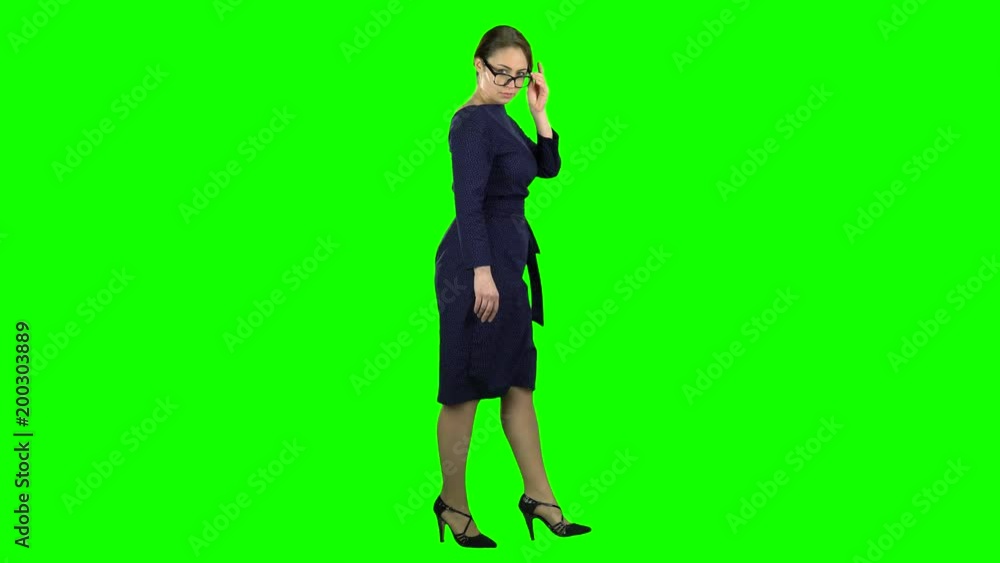 Teacher goes to class. Green screen. Side view Teacher goes to class. Green screen. Side view