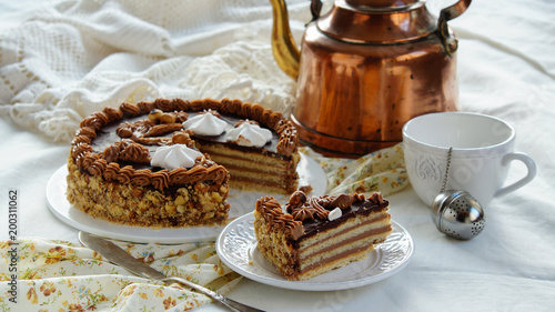 Foto cake made of Shortcrust pastry layers and chocolate  butter cream, soviet cake L
