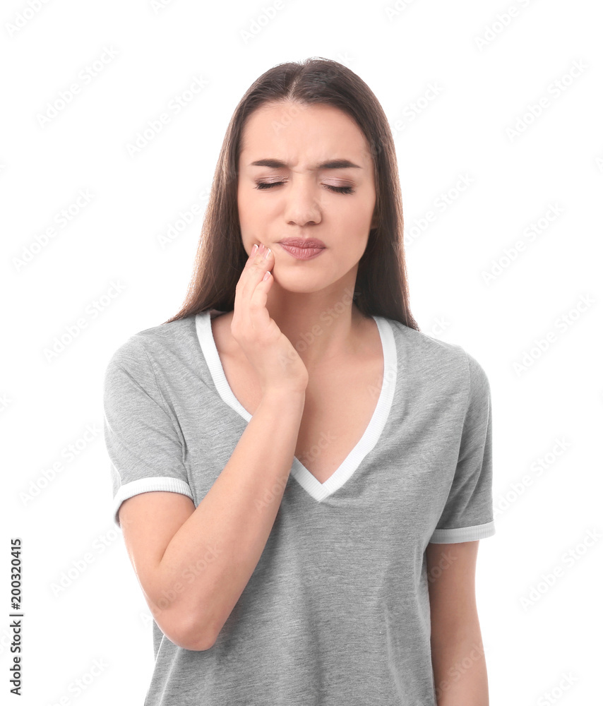 Young woman suffering from tooth ache on white background Young woman suffering from tooth ache on white background