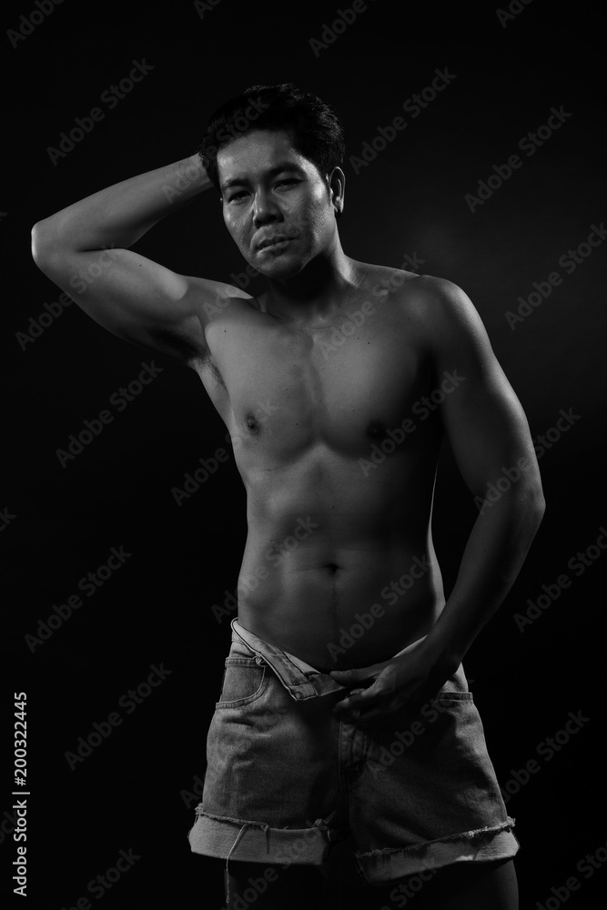 Portrait of an athletic Asian Man, black and white photo