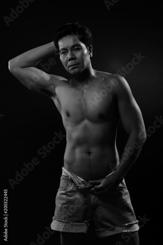 Portrait of an athletic Asian Man, black and white photo