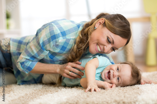 Mother with baby having a f...